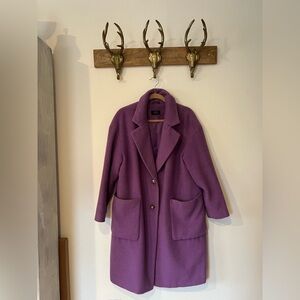 Marks & Spencers dreamy lilac coat with tortoiseshell buttons.
